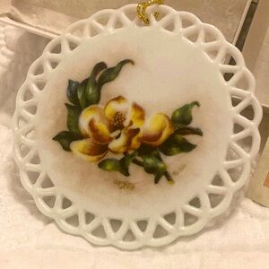 Southern magnolia Porcelain Ornament with lattice edges. Donna Peters artist.
